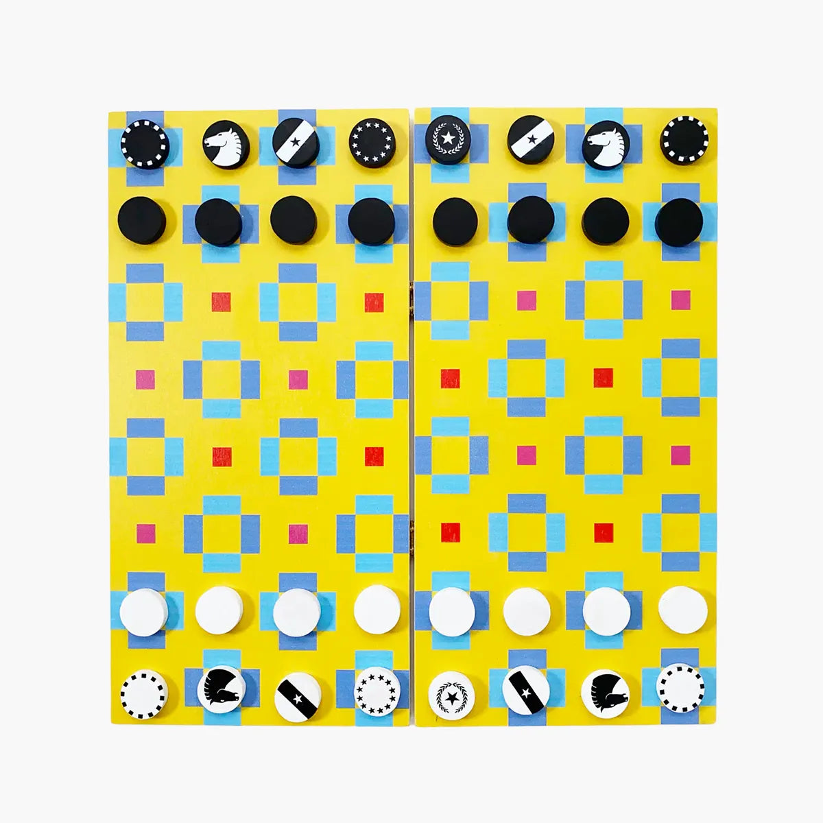 Black and white playing chess pieces on a yellow wooden chess board with geometric pattern