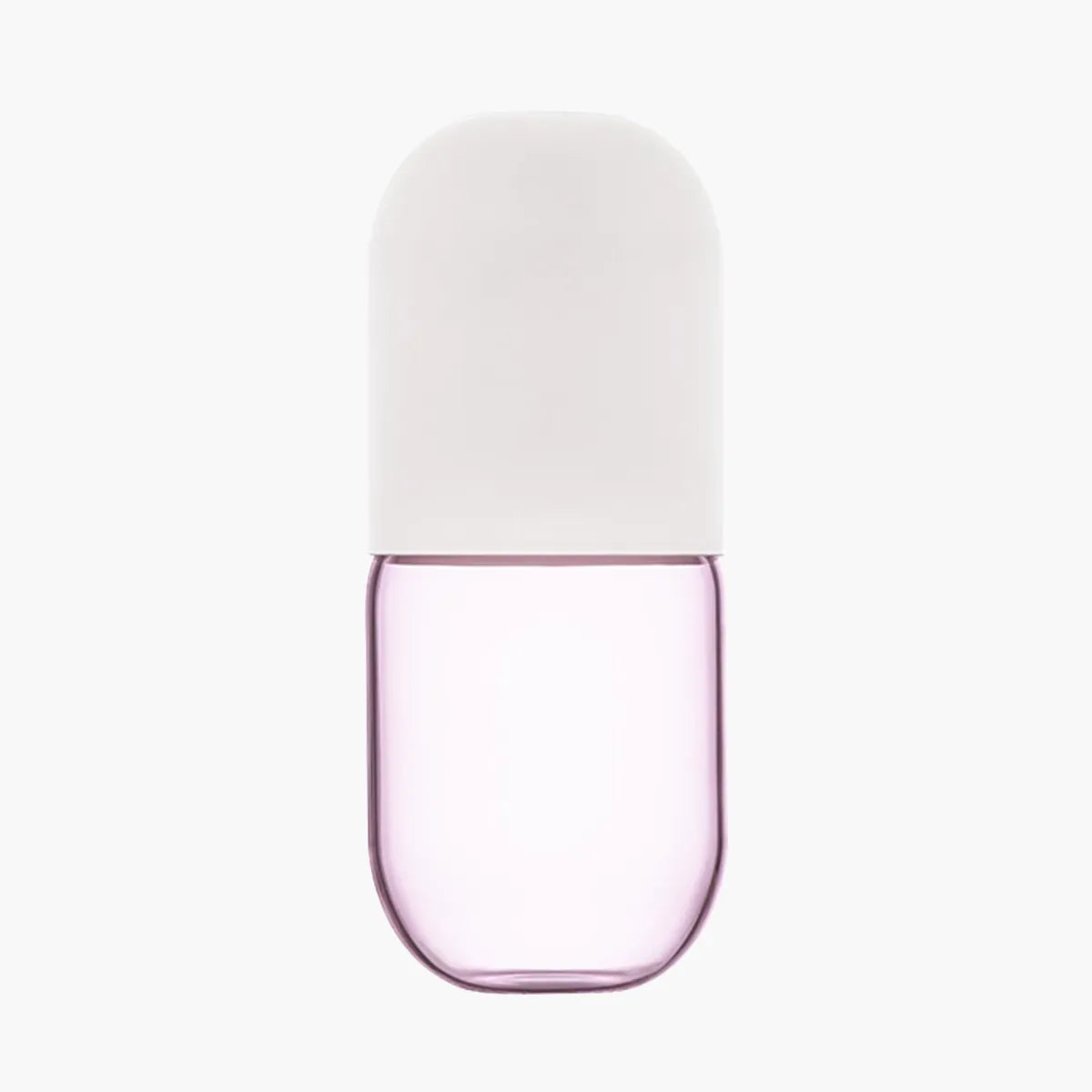 Pink glass carafe with a white lid on a white background
