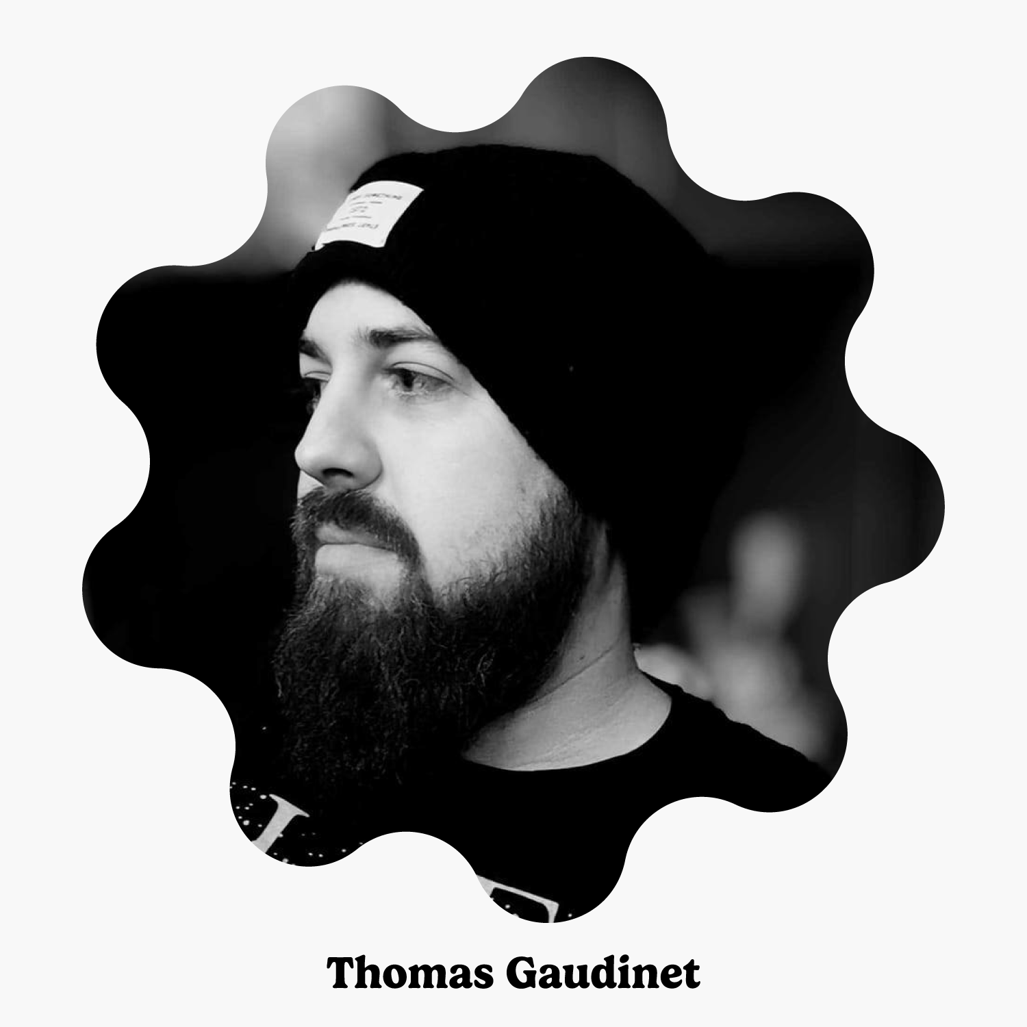 Black and white portrait of Thomas Gaudinet, desigenr of the Guarena Throw, with a stylized background.