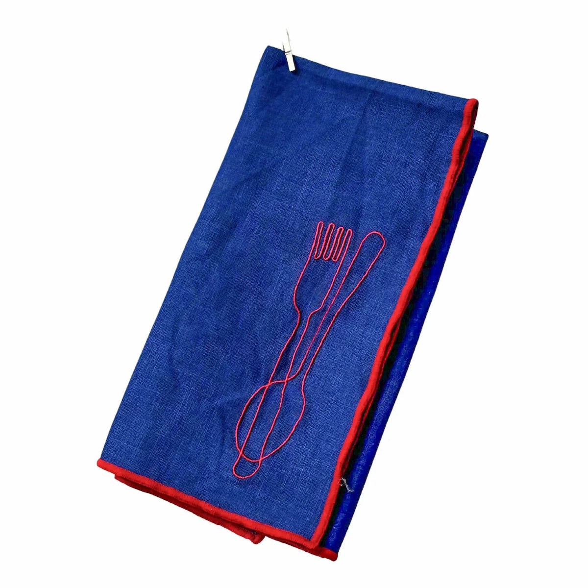 Blue napkin with red outline of a fork and spoon on a white background