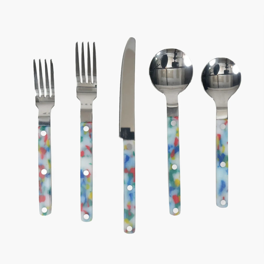 Utensils Set - Slowdown Studio. Set of cutlery with colorful handle designs on a white background