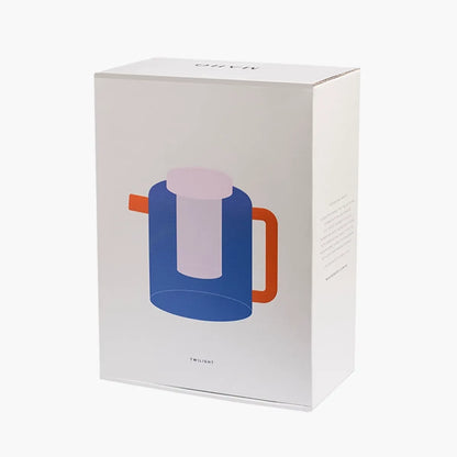 White box with a colorful teapot illustration on a white background