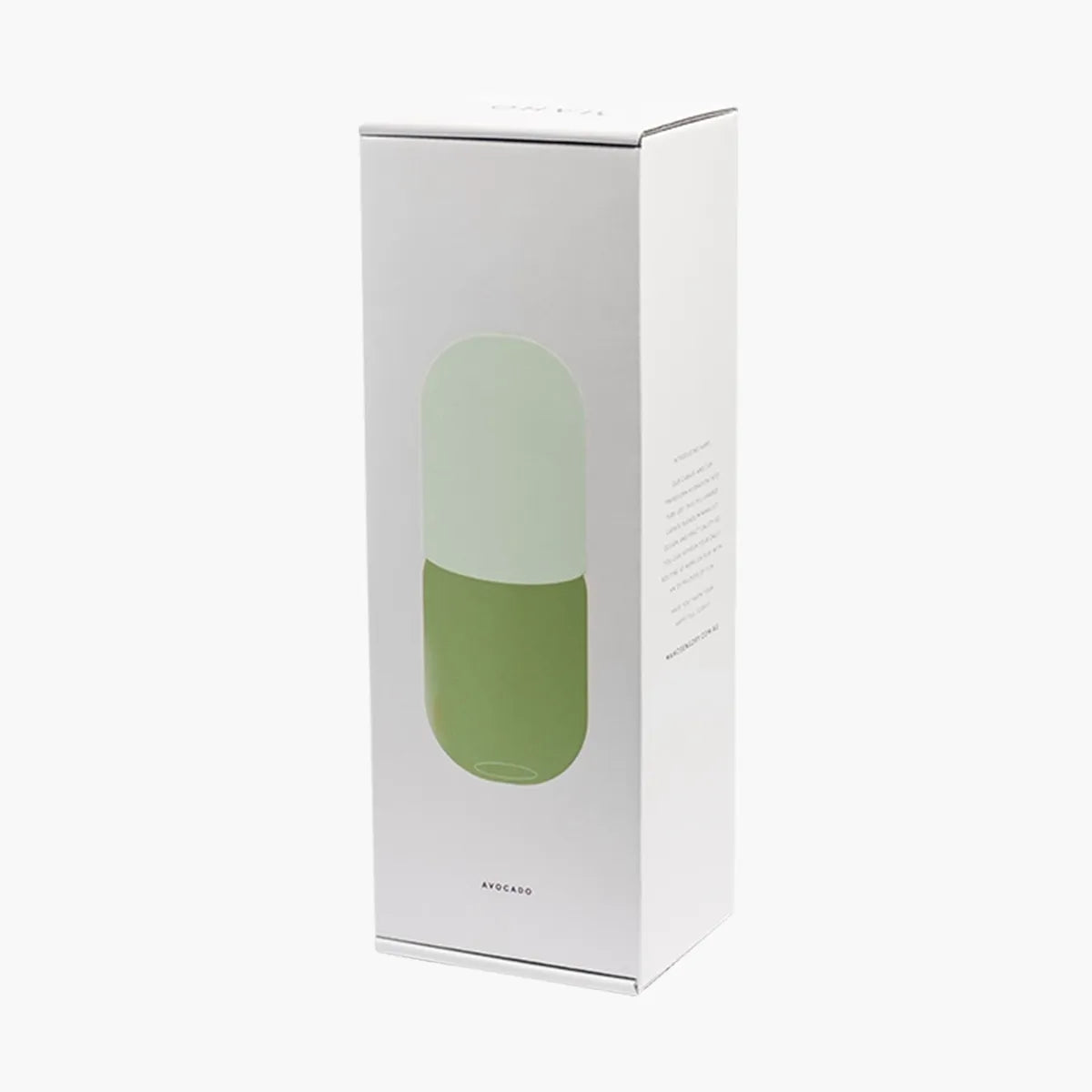 White packaging box with a green carafe and cup set inside on a white background