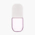 Pink glass carafe with a white lid on a white background