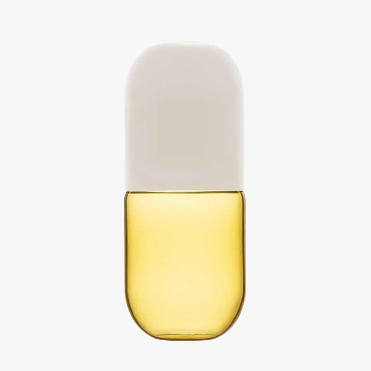 Yellow glass carafe with a white lid on a white background