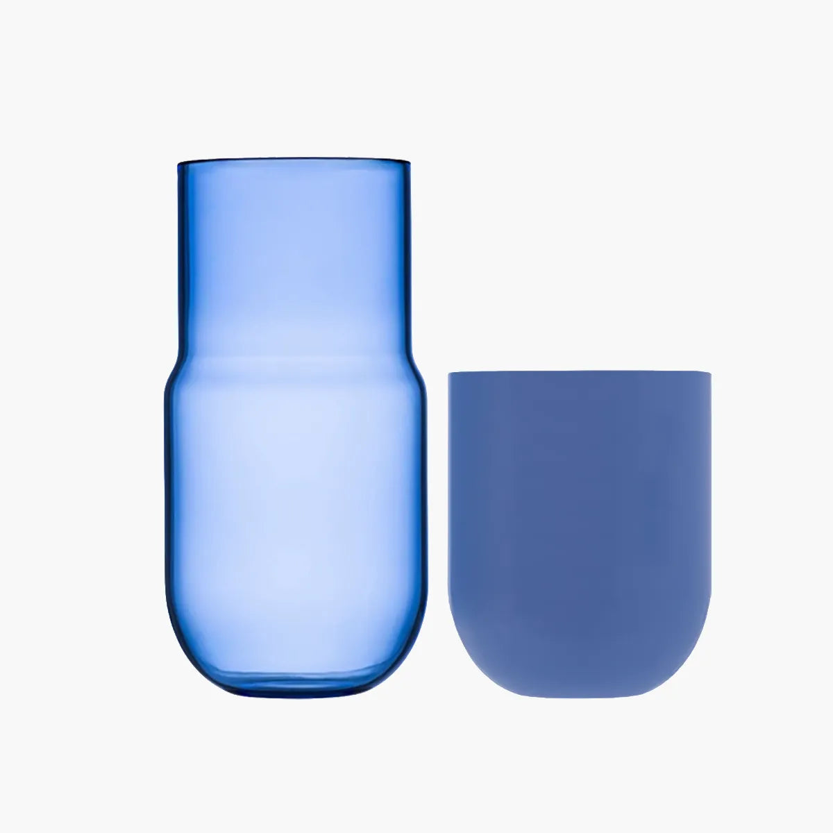 Blue glass carafe and cup on a white background