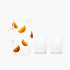 Clear glass pitcher and two glasses with orange slice design on a white background