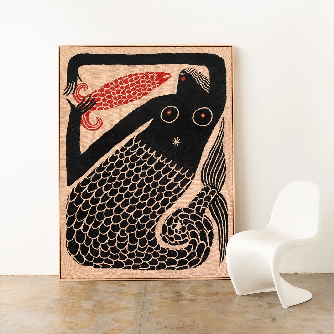 Framed throw artwork of a stylized mermaid with a hand holding a red fish. Folklore inspired artwork by artist Tabby Booth, throw created by Slowdown Studio.