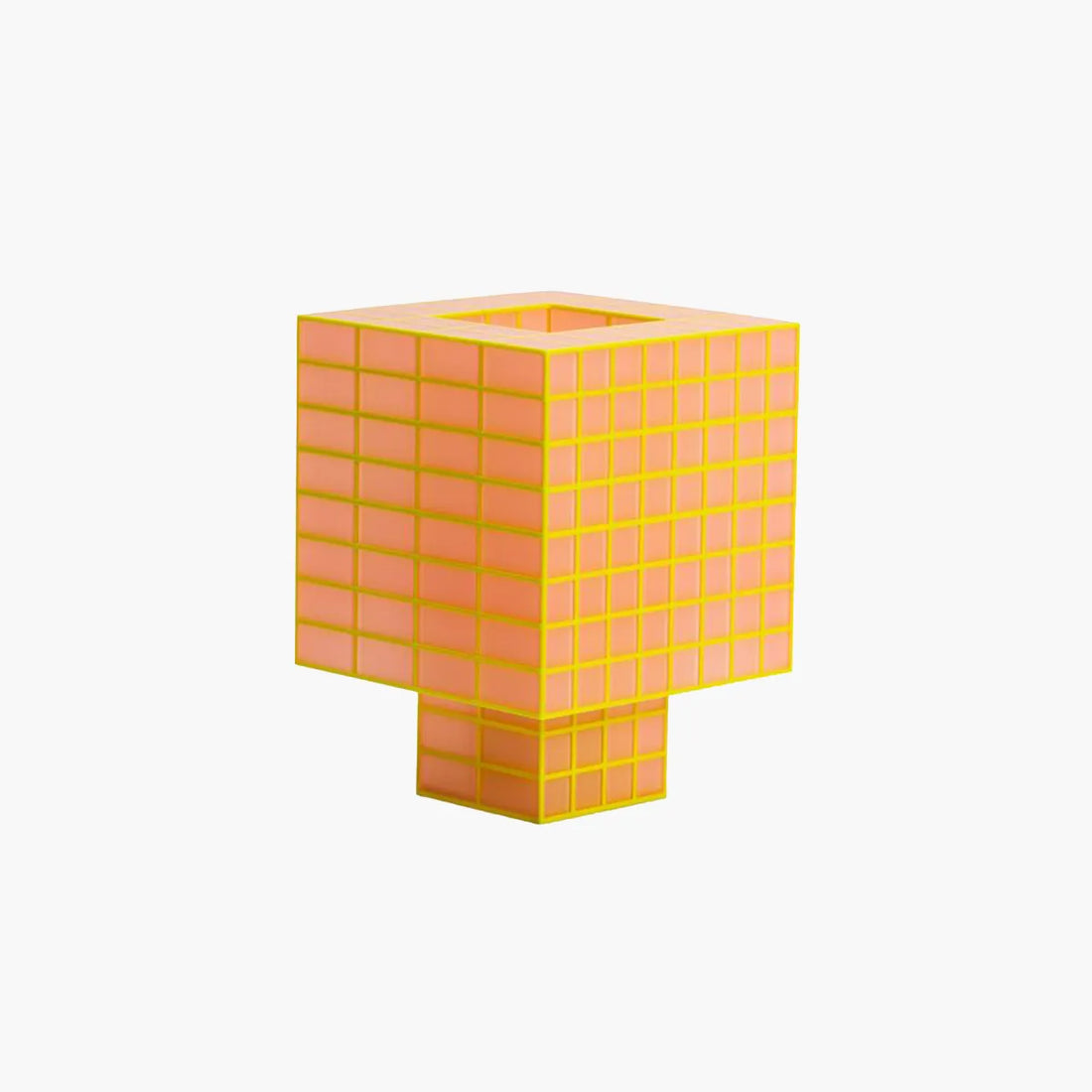 A Ridezign Tesser 8:3 table lamp with a translucent orange-yellow body, set against a white background.