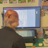 Italian artist Lucia Calfapietra drawing an art print design.